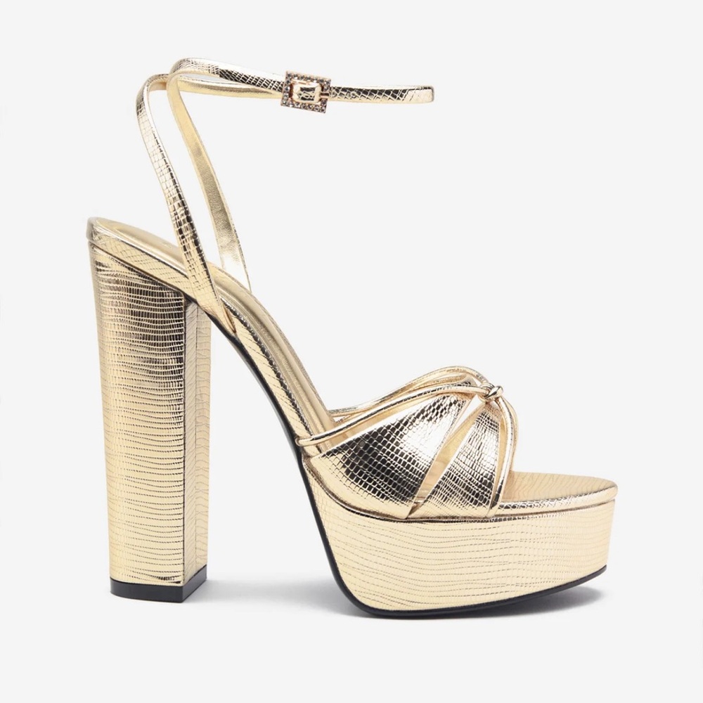 brand new metallic gold platforms, never worn, Size 9, Heel height: 4.9in/12.5cm
